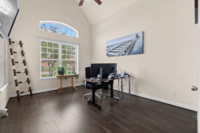 office area with high vaulted ceiling, ceiling fan, baseboards, and wood finished floors