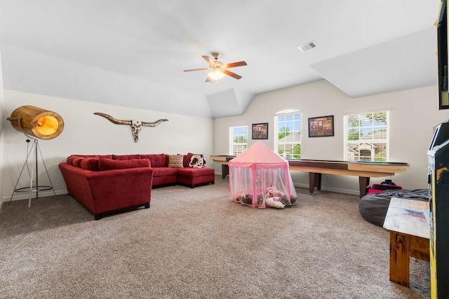 rec room with a healthy amount of sunlight, carpet, and a ceiling fan