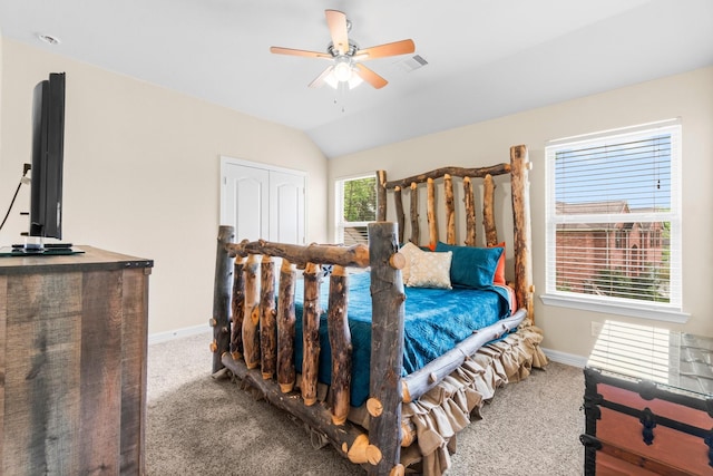 bedroom with vaulted ceiling, baseboards, a ceiling fan, and carpet flooring
