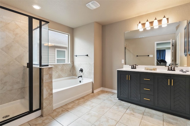 bathroom with a garden tub, double vanity, tile patterned floors, and a shower stall