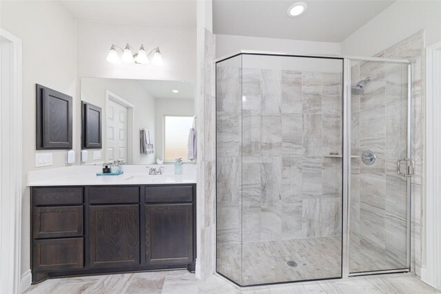 full bathroom featuring vanity and a stall shower