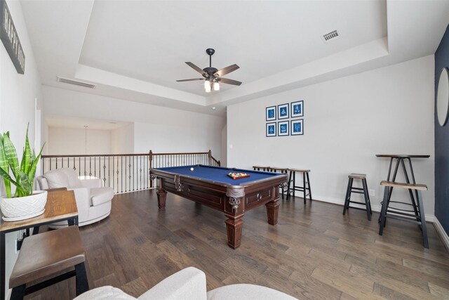 game room featuring visible vents, wood finished floors, ceiling fan, pool table, and a tray ceiling