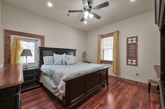 bedroom with baseboards, dark wood-type flooring, recessed lighting, and visible vents