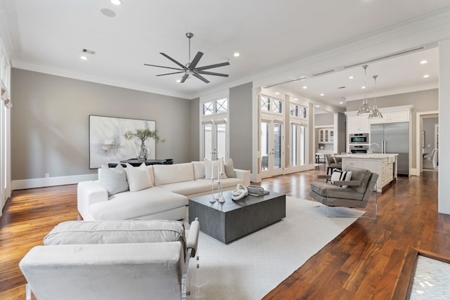 living area featuring ceiling fan, recessed lighting, dark wood-style floors, and visible vents