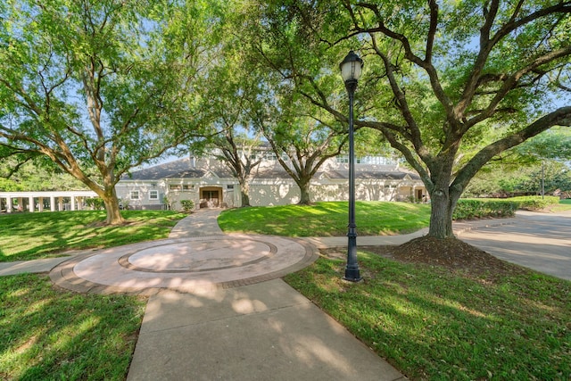 5818 Wilkins Ln, Sugar Land, TX 77479 - view of front of home with a front yard