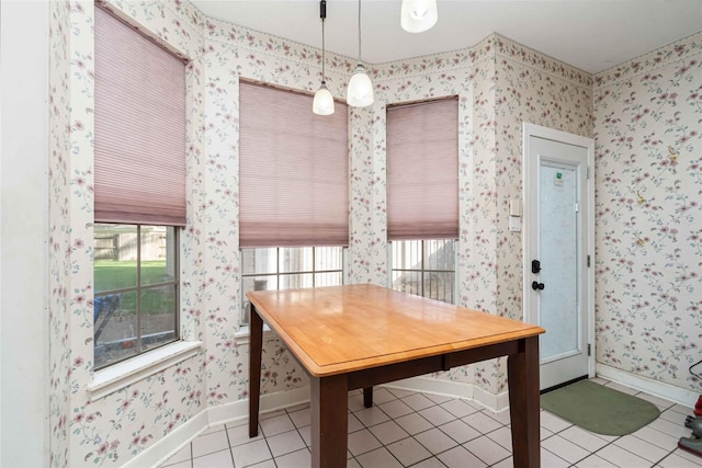 5818 Wilkins Ln, Sugar Land, TX 77479 - tiled dining room featuring baseboards and wallpapered walls