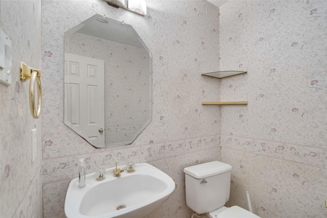 5818 Wilkins Ln, Sugar Land, TX 77479 - half bath with toilet and a sink
