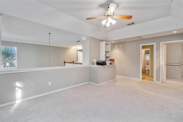 5818 Wilkins Ln, Sugar Land, TX 77479 - spare room with baseboards, ceiling fan, light colored carpet, recessed lighting, and a raised ceiling
