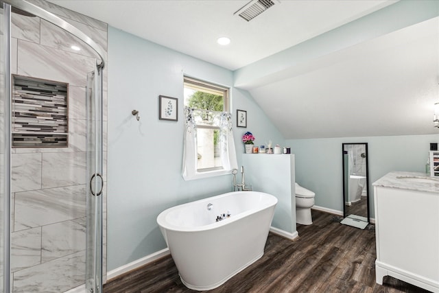 full bath featuring visible vents, wood finished floors, a stall shower, and a soaking tub