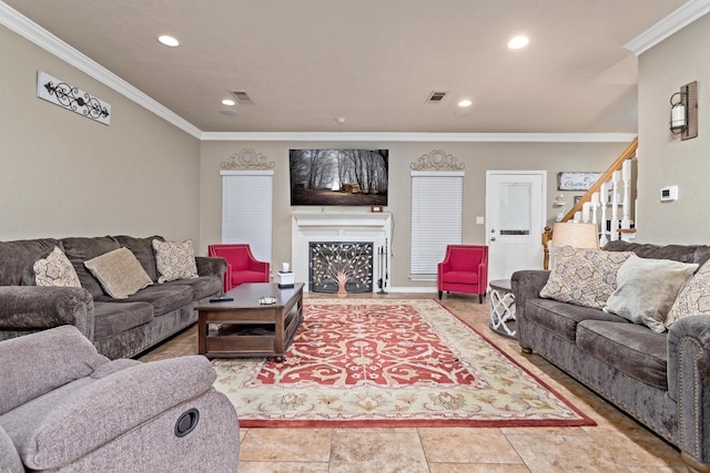 living room featuring recessed lighting, visible vents, ornamental molding, and stairway