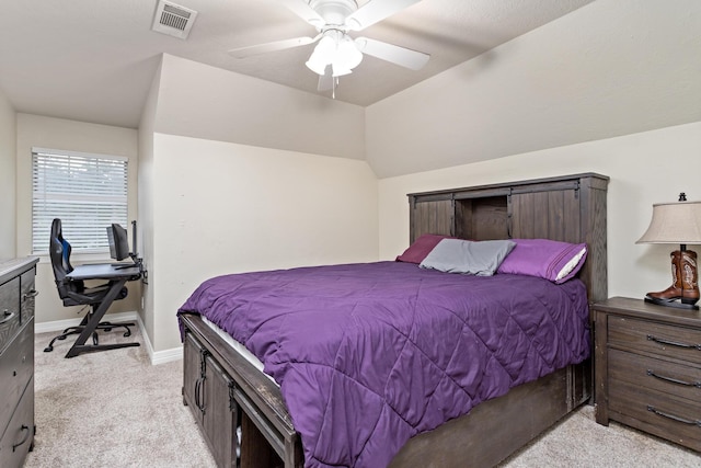 bedroom featuring visible vents, baseboards, ceiling fan, and light carpet