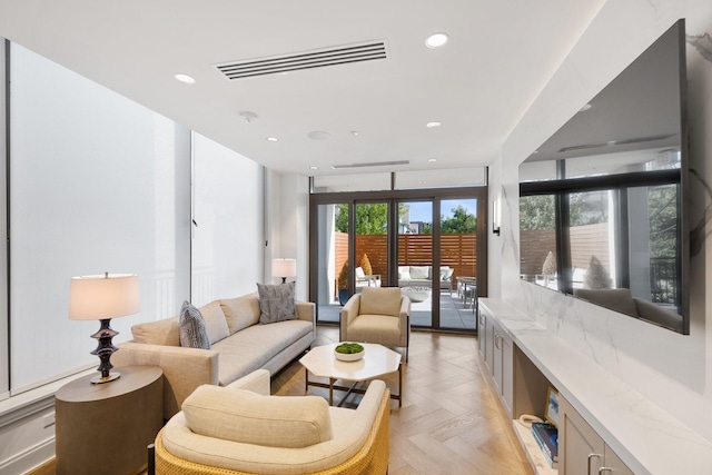 2323 W Main St Unit 703, Houston, TX 77098 - living room featuring recessed lighting and visible vents
