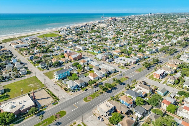 bird's eye view with a water view and a view of the beach