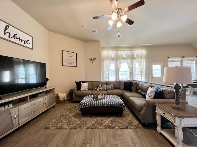 12813 Narrow Cove Dr, Texas City, TX 77568 - living area with ceiling fan and wood finished floors