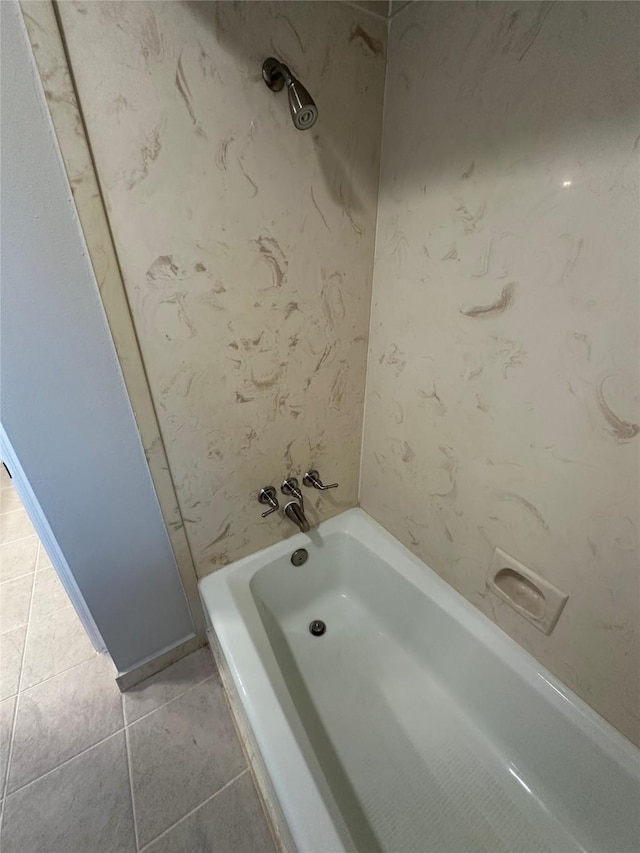 full bath featuring tile patterned flooring and shower / bathing tub combination