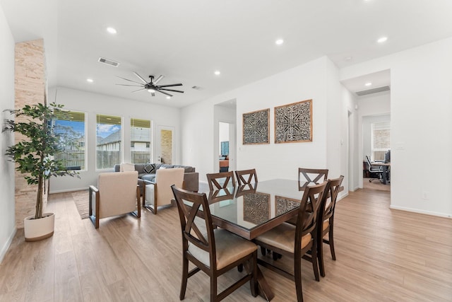 dining space with light wood-type flooring, recessed lighting, visible vents, and a wealth of natural light