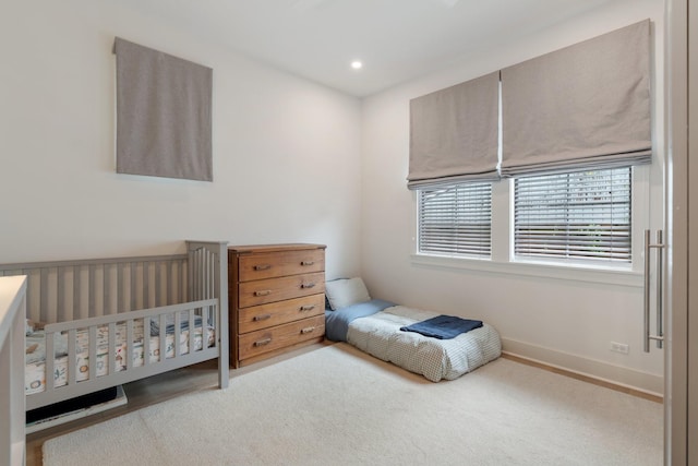 bedroom with baseboards and recessed lighting
