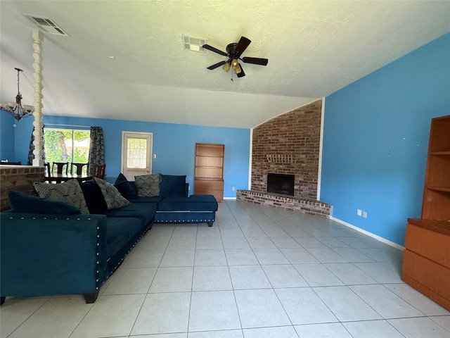 710 Fawnwood Dr, Missouri City, TX 77489 - tiled living area with visible vents, a fireplace, a ceiling fan, and lofted ceiling