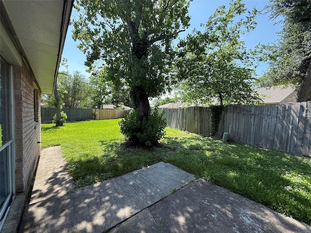 710 Fawnwood Dr, Missouri City, TX 77489 - view of yard featuring a patio and a fenced backyard