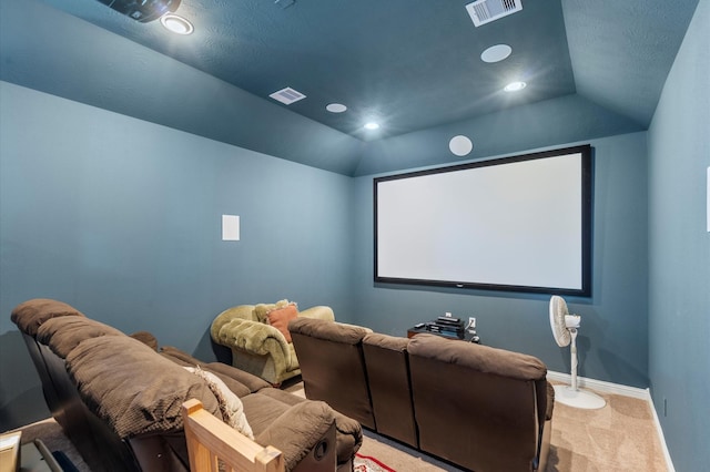 carpeted home theater featuring baseboards, lofted ceiling, recessed lighting, and visible vents