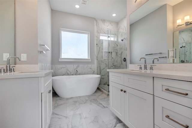 full bathroom featuring a sink, marble finish floor, two vanities, and a marble finish shower