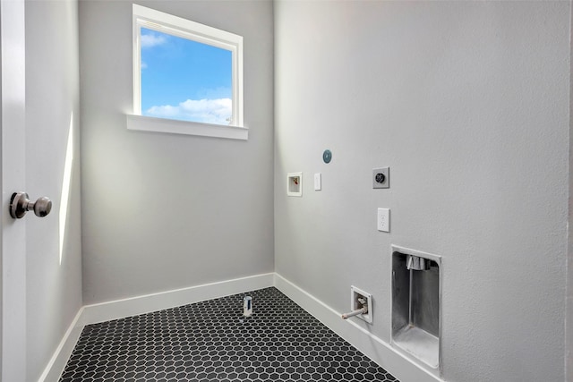 laundry area featuring hookup for an electric dryer, laundry area, baseboards, and hookup for a washing machine