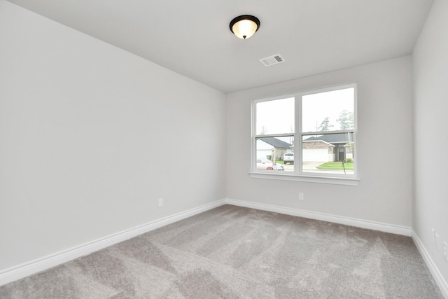 10310 Woodhill Spa Ln, Cleveland, TX 77327 - carpeted spare room featuring baseboards