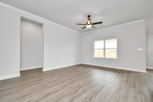 10310 Woodhill Spa Ln, Cleveland, TX 77327 - unfurnished room featuring wood finished floors, ceiling fan, baseboards, and crown molding