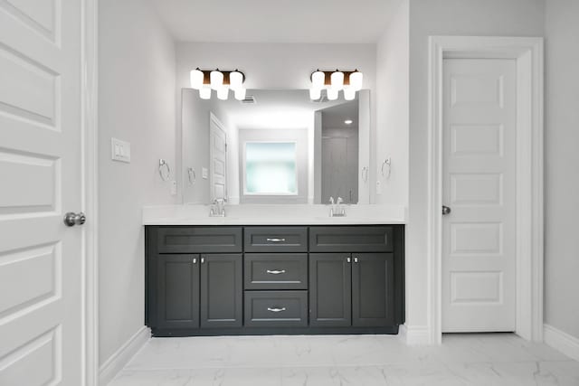 10310 Woodhill Spa Ln, Cleveland, TX 77327 - full bath featuring marble finish floors, double vanity, baseboards, and a shower