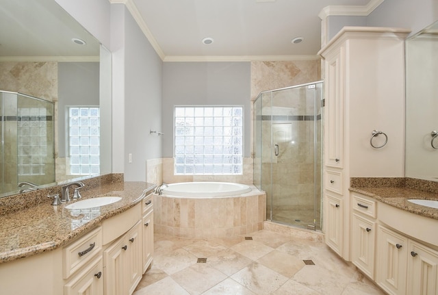 bathroom with a sink, ornamental molding, and a shower stall