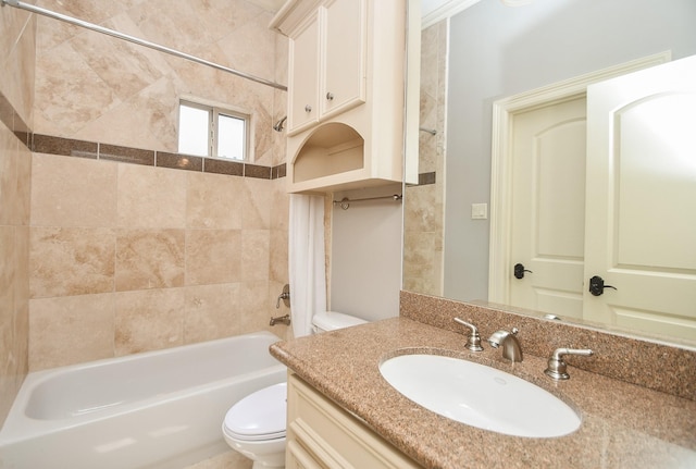 full bathroom featuring toilet, shower / bathing tub combination, and vanity