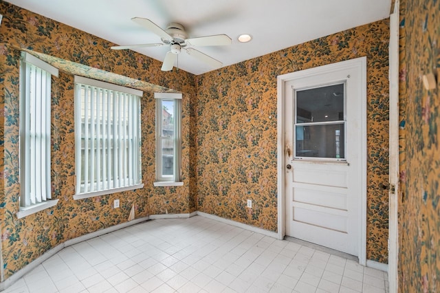 empty room featuring light tile patterned floors, ceiling fan, recessed lighting, and baseboards