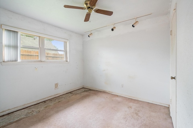 unfurnished room with a ceiling fan