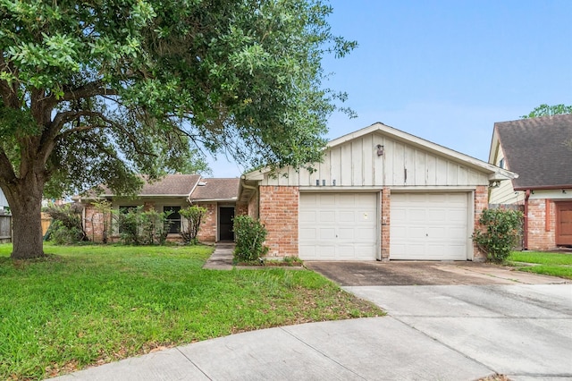 ranch-style house with a garage, a front yard, brick siding, board and batten siding, and driveway