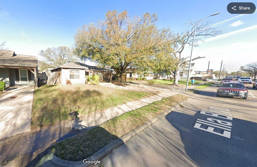 view of front of home with a residential view