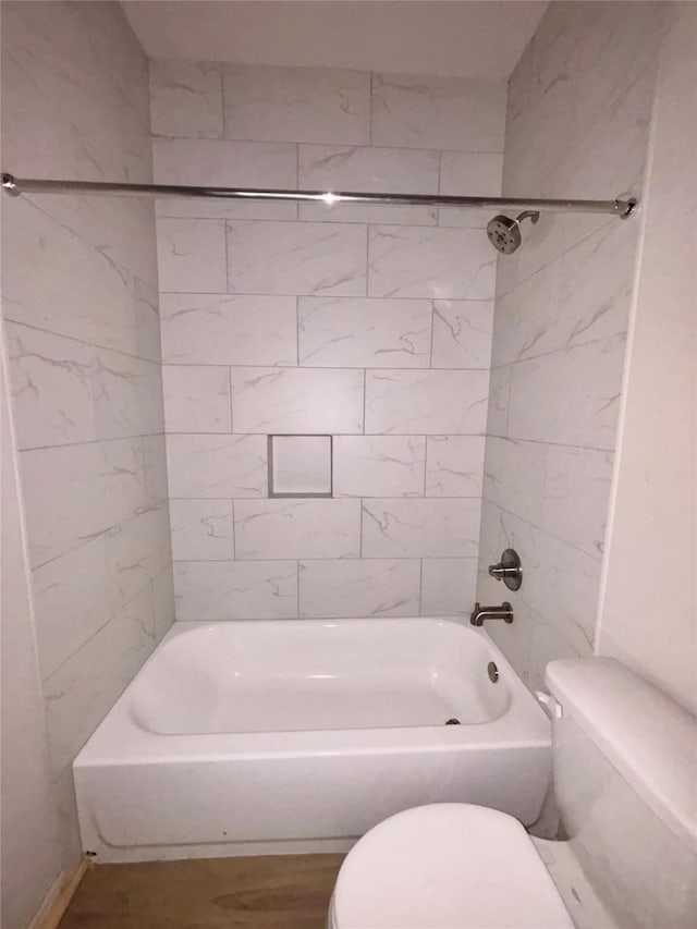 full bath featuring tub / shower combination and toilet