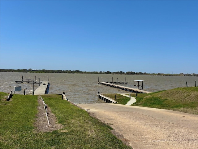 dock area featuring a water view