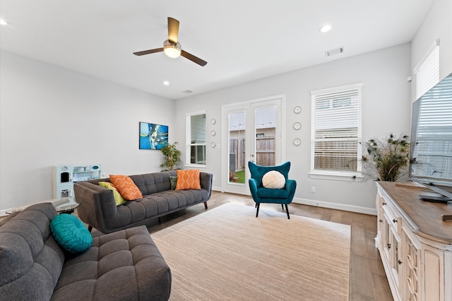 living room featuring visible vents, recessed lighting, light wood-style floors, and ceiling fan