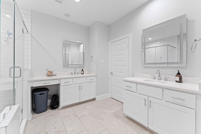 full bath featuring two vanities, recessed lighting, a shower stall, and a sink