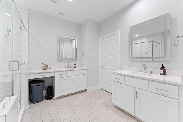 1511B Crockett St, Houston, TX 77007 - bathroom with a shower stall, two vanities, and recessed lighting
