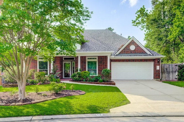 view of front facade featuring a garage, a front lawn, fence, roof with shingles, and driveway