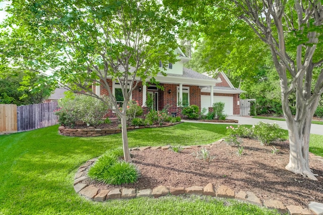 obstructed view of property with driveway, brick siding, fence, a front lawn, and an attached garage