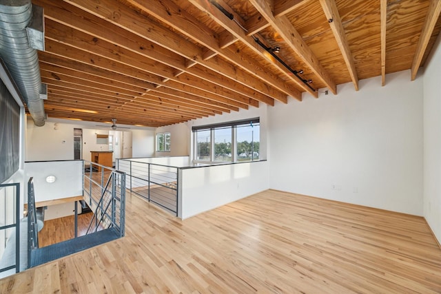 below grade area featuring wood finished floors