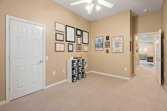 2220 W Marsala Dr, Pearland, TX 77581 - interior space featuring light colored carpet, arched walkways, and baseboards