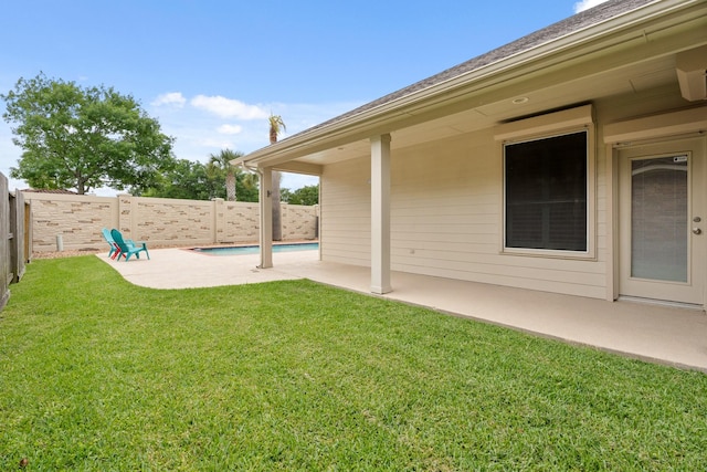 view of yard featuring a patio and a fenced backyard