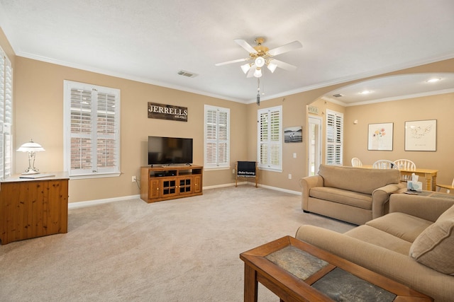 2220 W Marsala Dr, Pearland, TX 77581 - living room featuring visible vents, a ceiling fan, baseboards, light colored carpet, and arched walkways