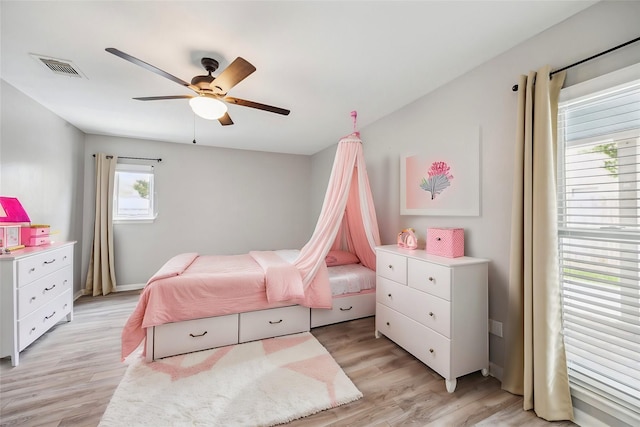 14123 Hillvale Dr, Houston, TX 77077 - bedroom featuring visible vents, light wood-style floors, and ceiling fan