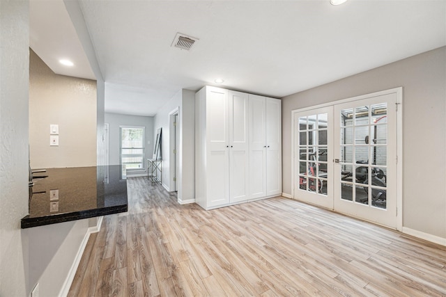 14123 Hillvale Dr, Houston, TX 77077 - interior space featuring recessed lighting, baseboards, light wood-type flooring, and visible vents