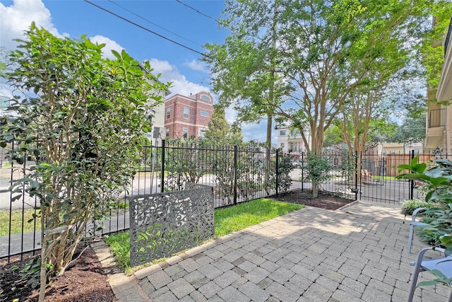 view of patio / terrace featuring fence