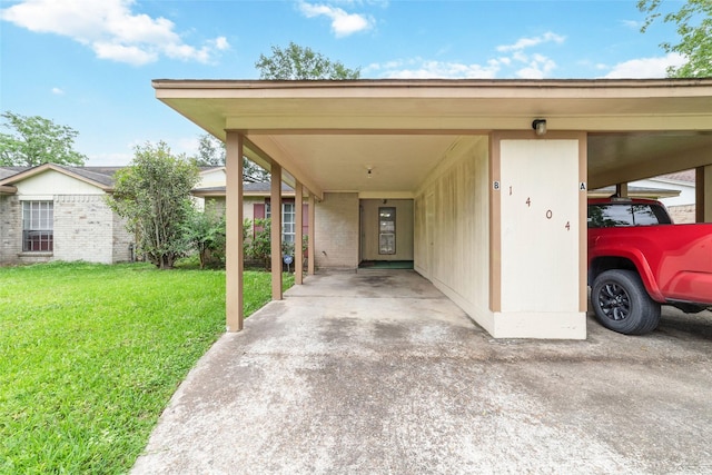 exterior space featuring a lawn, brick siding, and a carport